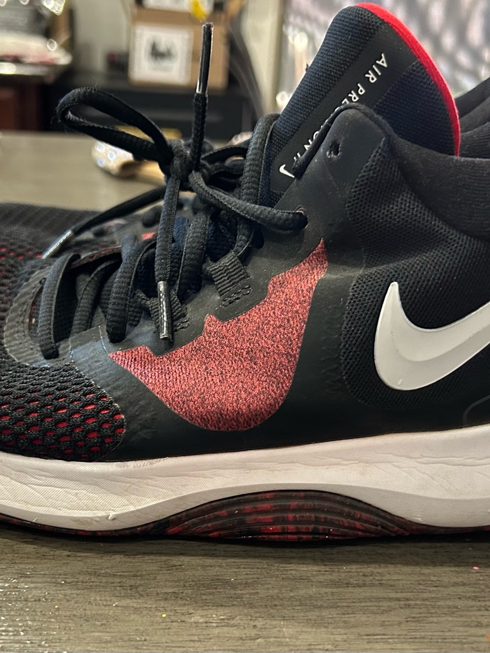Nike Kids Black and Red Low-Top Sneakers with White Swoosh